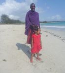Malaika with Masai at Kipepeo Beach