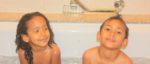 Bath time with my brother Amani